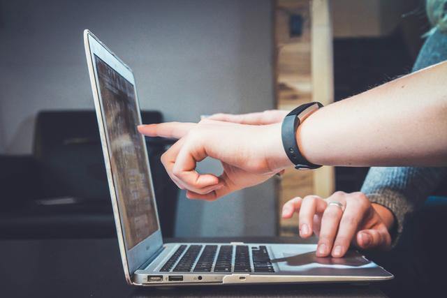 Person reviewing personalized roadmap with mentor